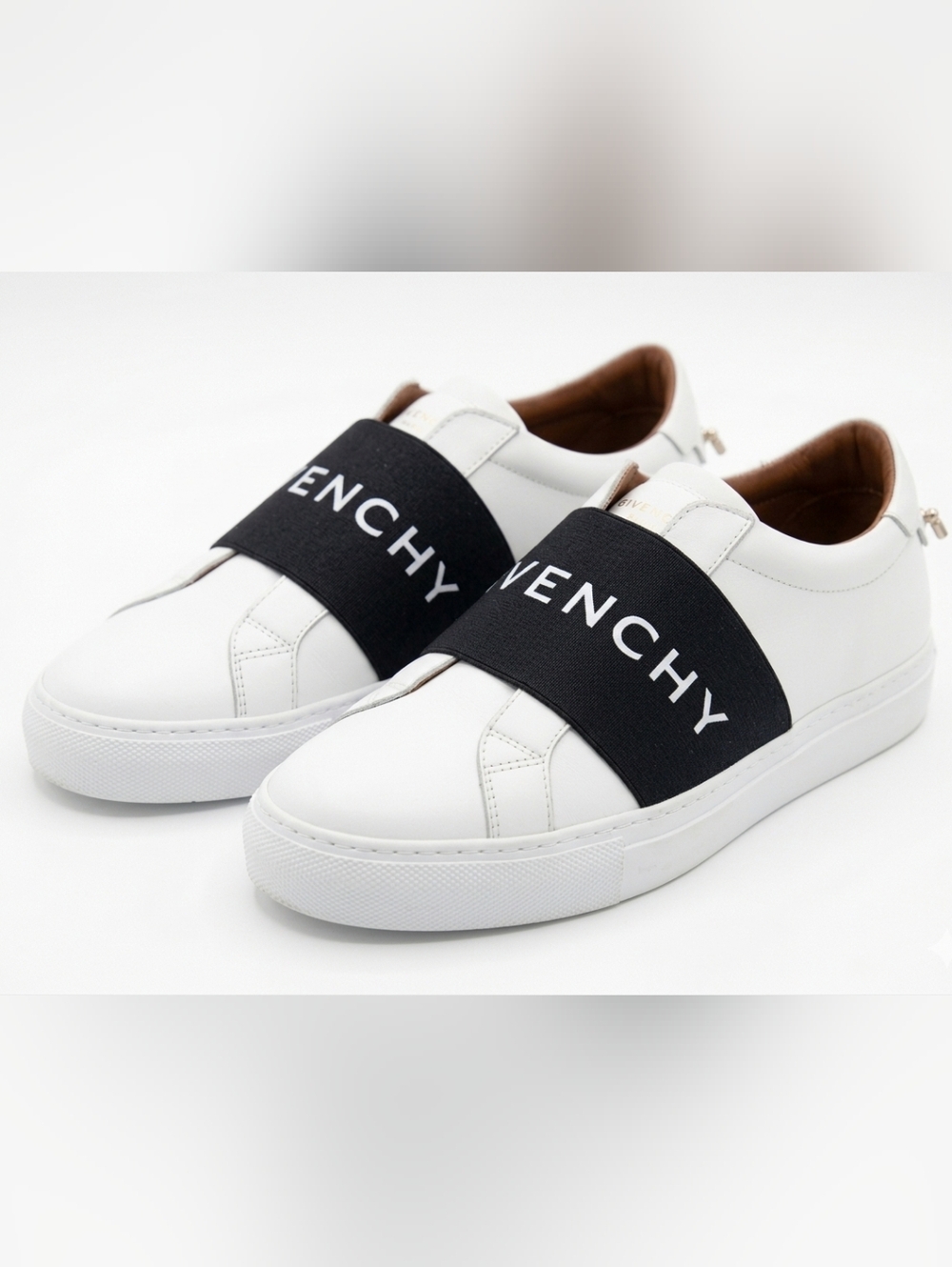 Givenchy White Leather Slip-On Sneakers with Black Logo Band and Gold Accents